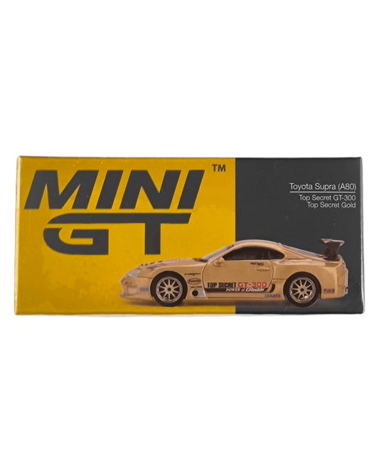 MINI GT Toyota Supra (A80) Top Secret GT-300 – Top Secret Gold RHD 1:64